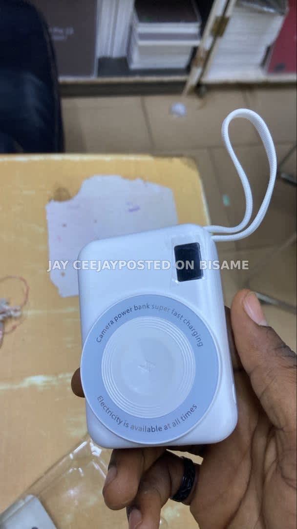 Camera design Fast Charging Wireless powerbank with External Cables. Brand New