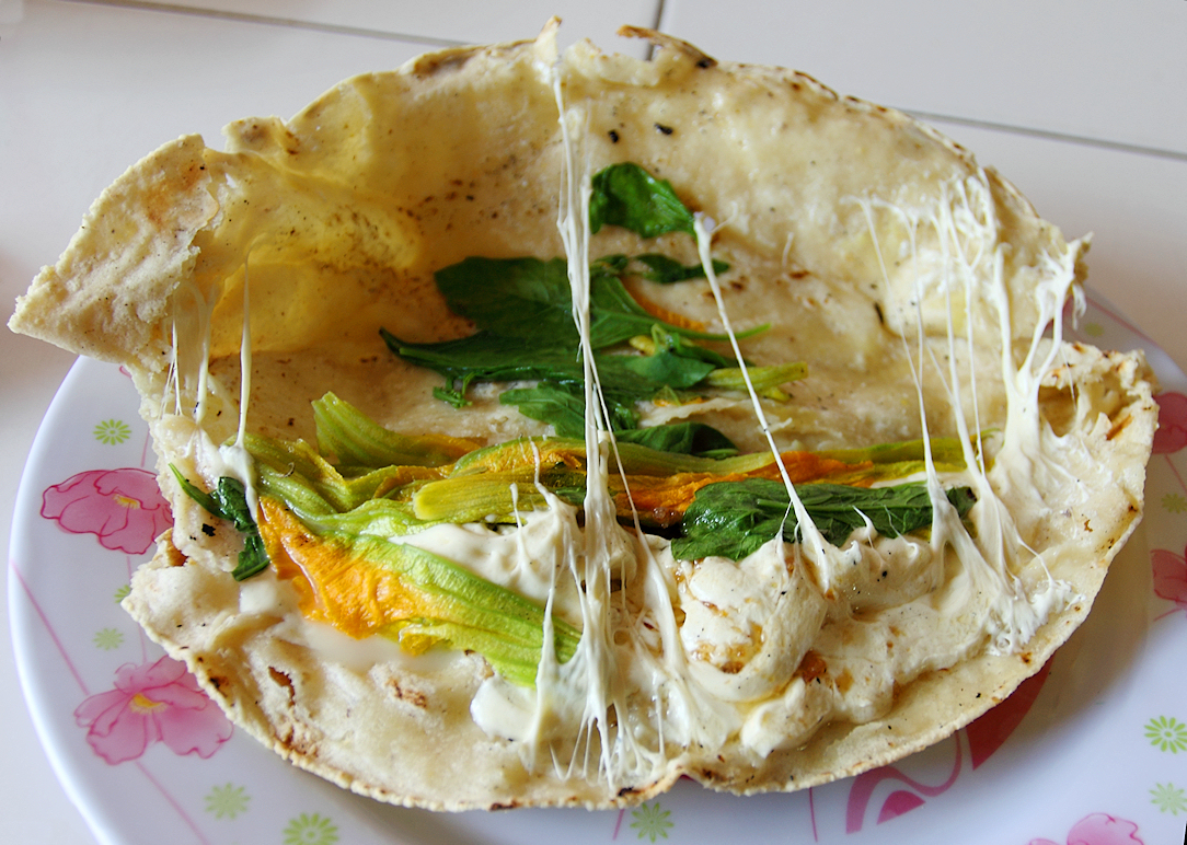 Quesadillas de Flor de Calabaza (Masa Turnovers with Squash Blossoms and Oaxaca Cheese)