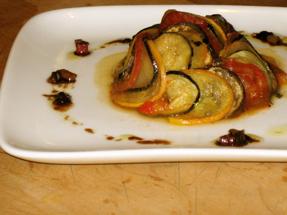Confit Byaldi (Slow-Baked Spiral of Courgette, Aubergine and Tomato on Piperade)