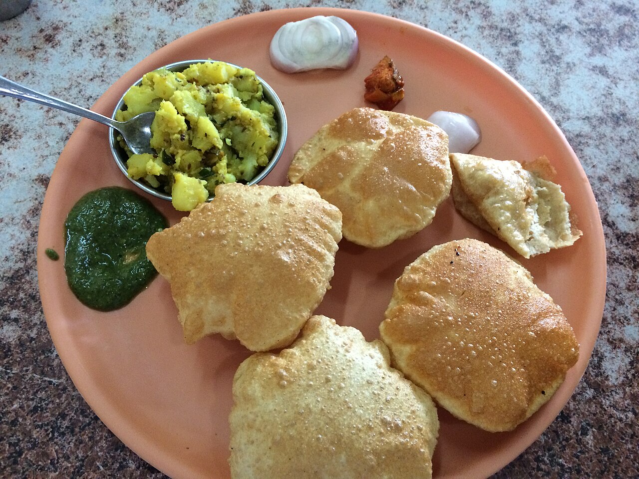 Puri Bhaji (Puffed Fried Wheat Bread with Spiced Potatoes)