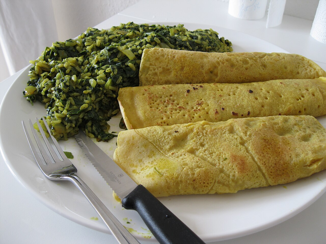 Sinasir (Hausa Fermented Rice Pancakes with Spinach Sauce)