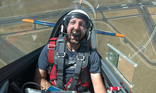 Air show promo shot from 2017.  Flying the Extra 330LX with an actual camera operator in the front seat.  Taken in Corvallis, Oregon.