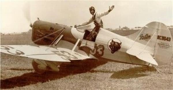 Bob Hall standing on the Gee Bee Model D Speedster