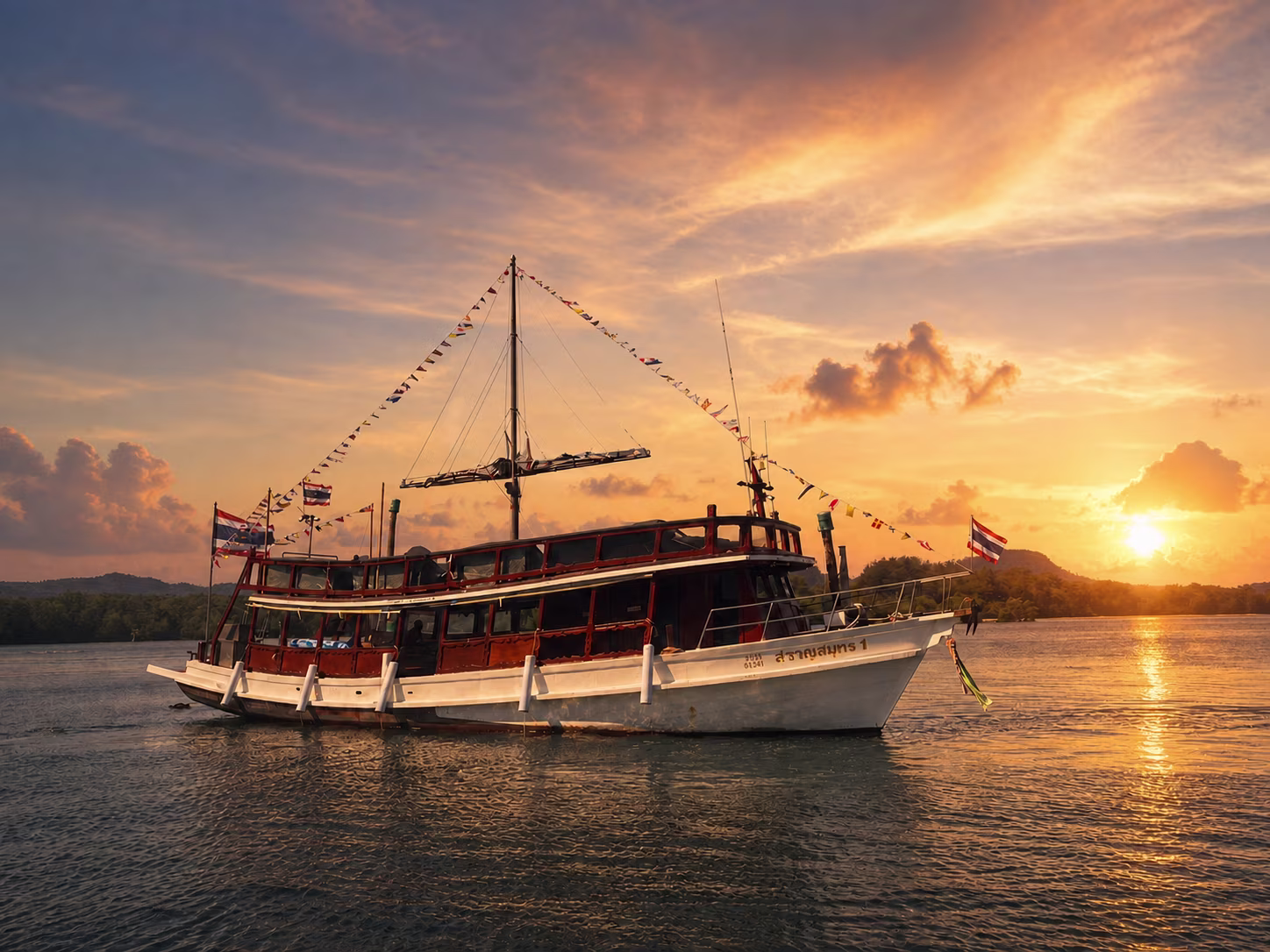 Bamboo Sunset Cruise boat at sunset