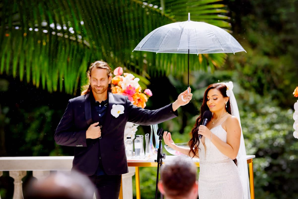 Beautiful wedding ceremony in the rain
