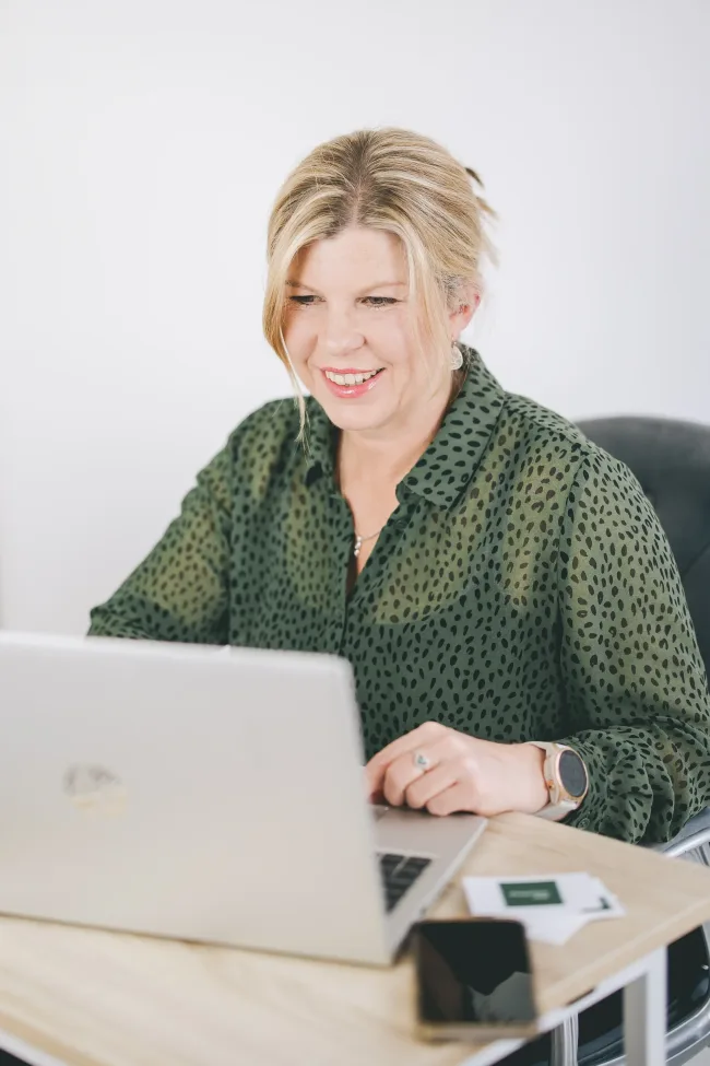 Kate on VC with a client