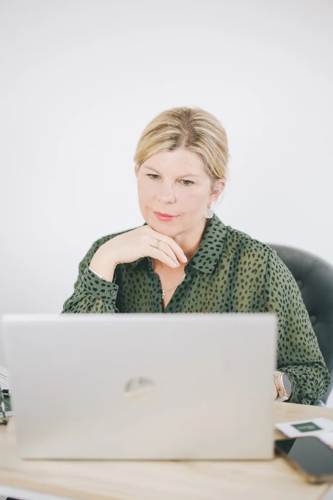 Kate on VC with a client