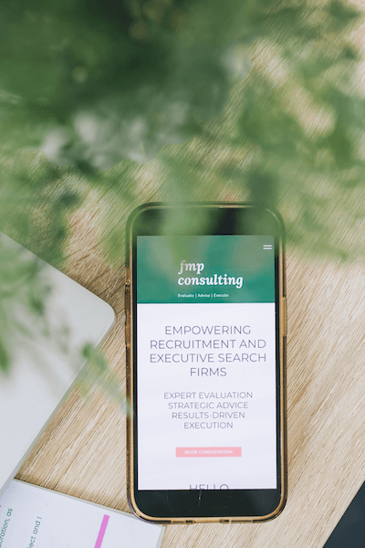 mobile phone displaying FMP consulting website