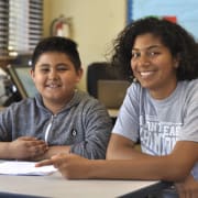 High school volunteer with elem student