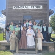 Volunteers outside of Pioneer ViIlage General Stor