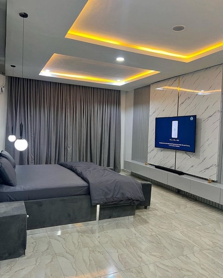 Modern Grey Bedroom with Illuminated Gypsum Ceiling