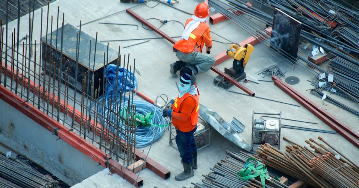 Contractor reviewing home loan documents in Sydney