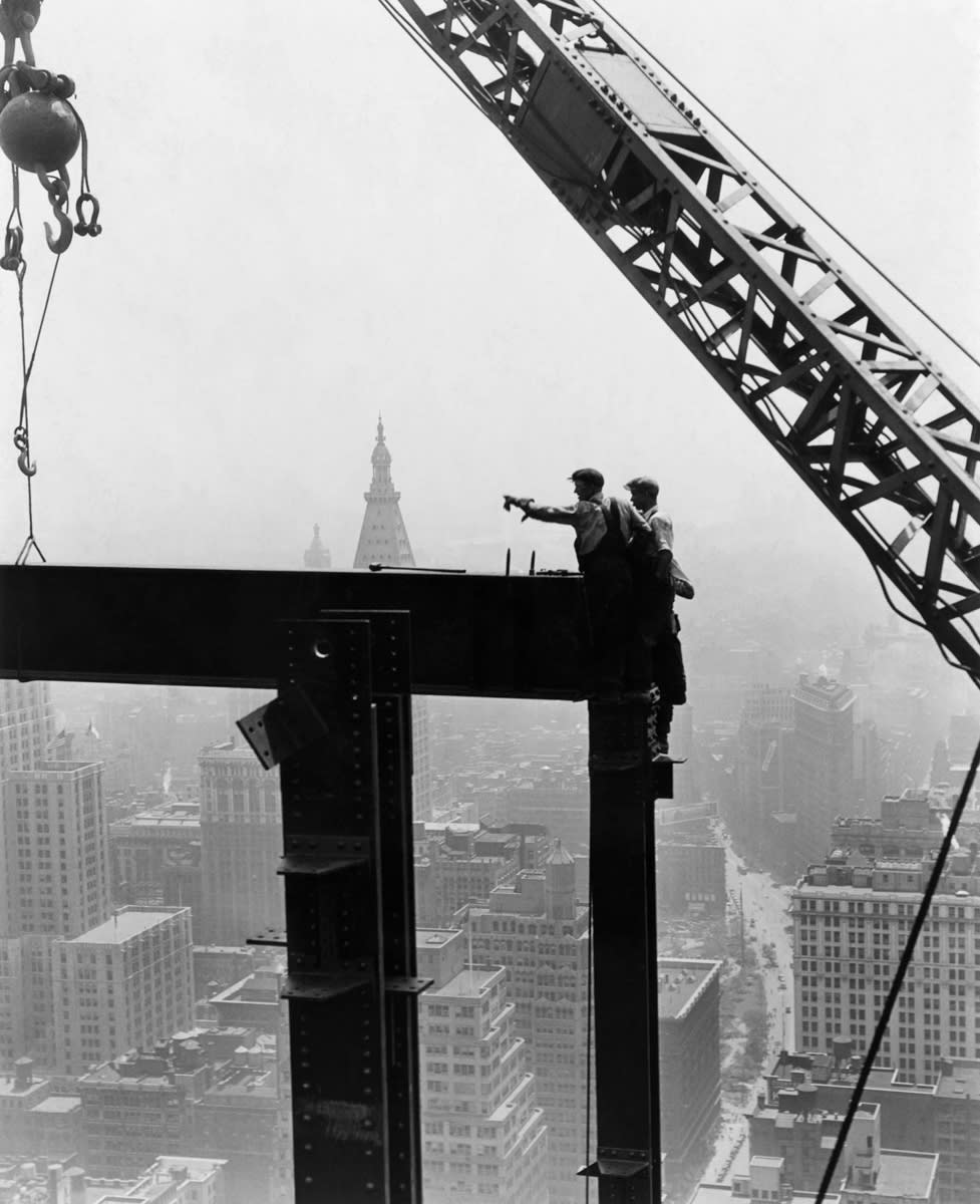 Derrick and workers on girder,
1930-1931