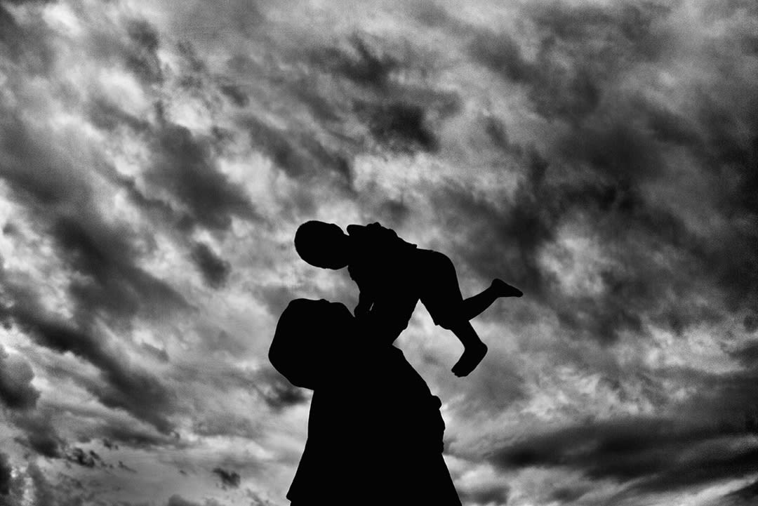 On the roof, my wife Negar is holding our 22-month-old child Imran during the cyclone warning. He was sick, but we took hi...
