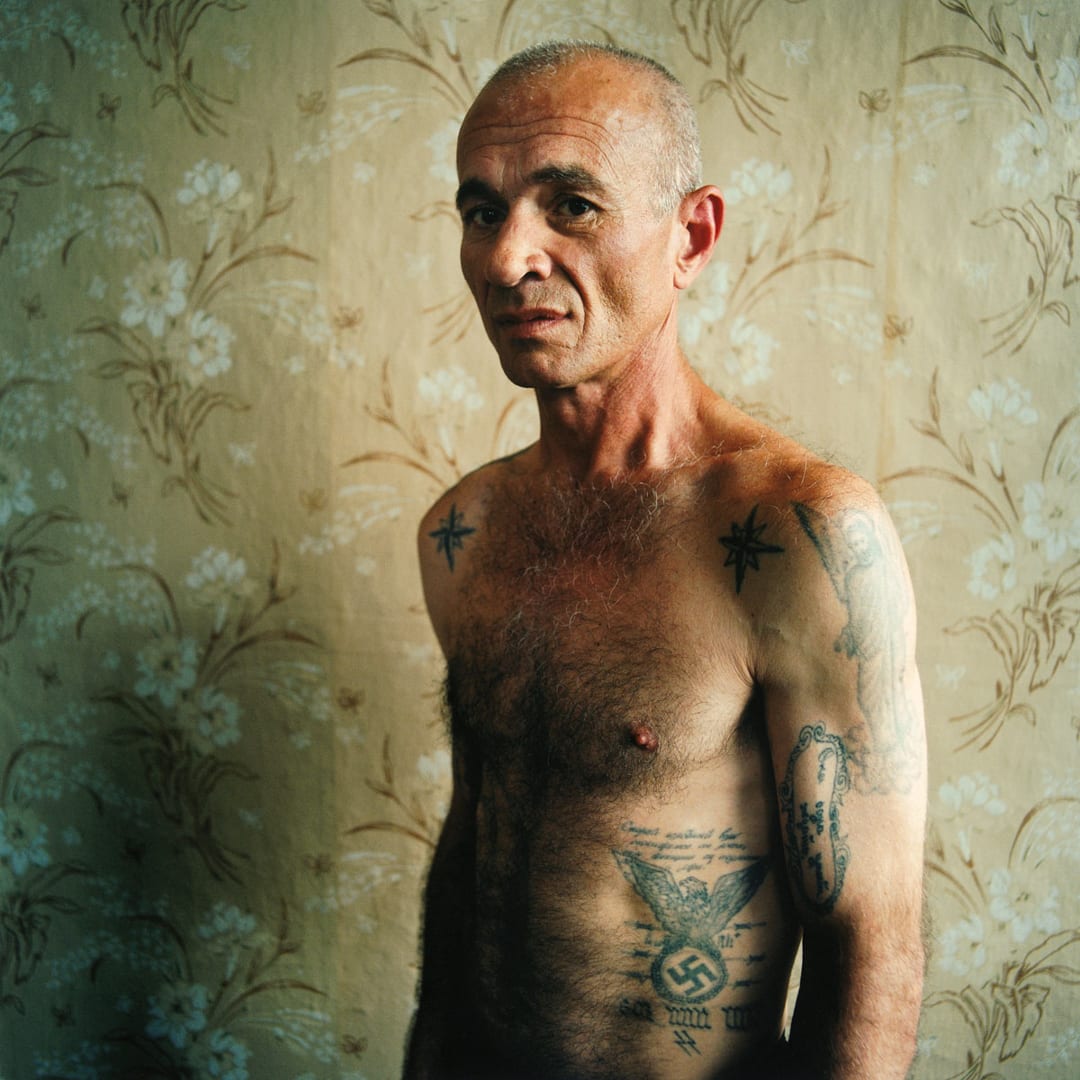 A man with swastica tattoo