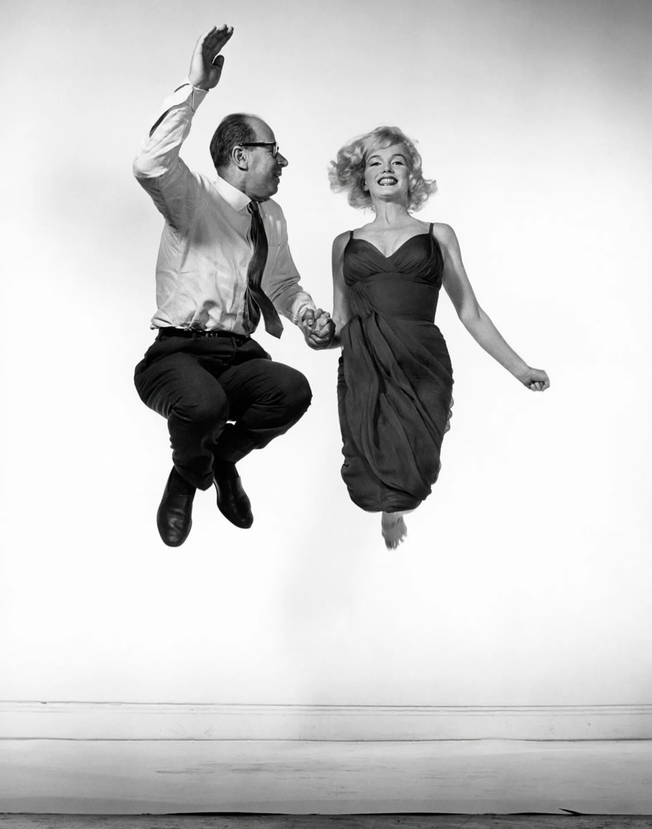 American actress Marilyn Monroe jumping with Philippe Halsman. USA. 1959