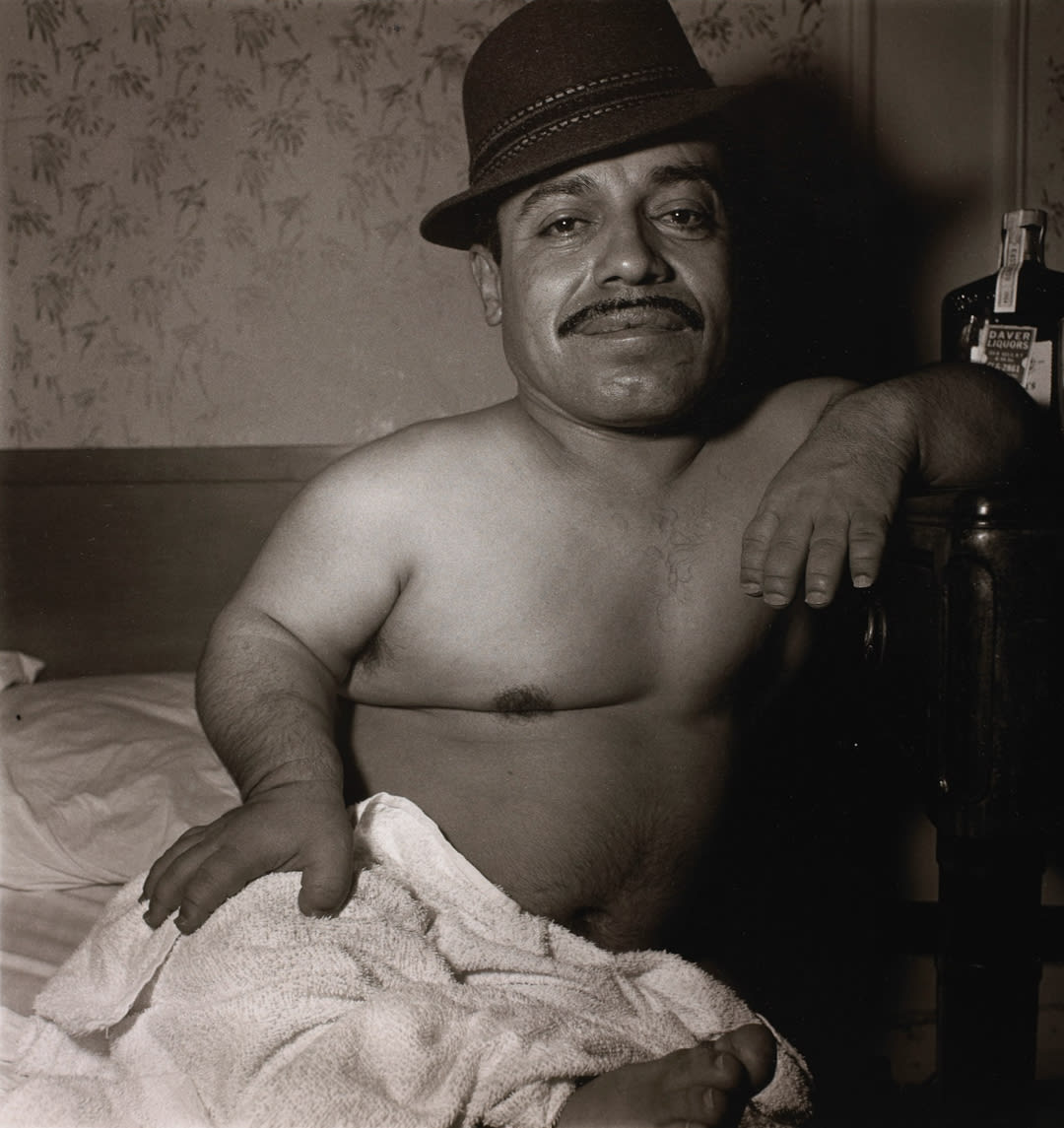 Mexican dwarf in his hotel room in NYC 1970
