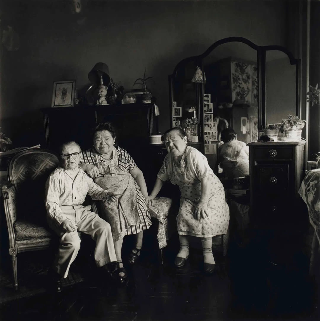 Russian midget friends in a living room on 100th Street, N.Y.C. 1963
