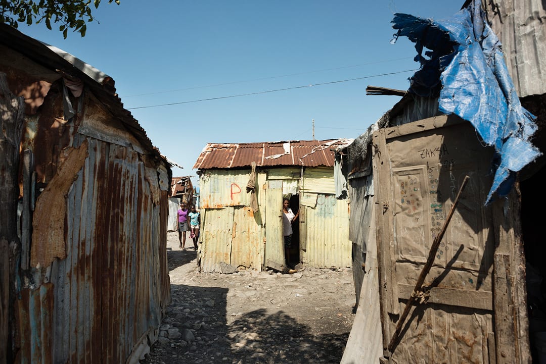 Haiti, Port-au-Prince, Cité Soleil. Daily life in the densely populated and violent Cité Soleil. The slum is controlled by...