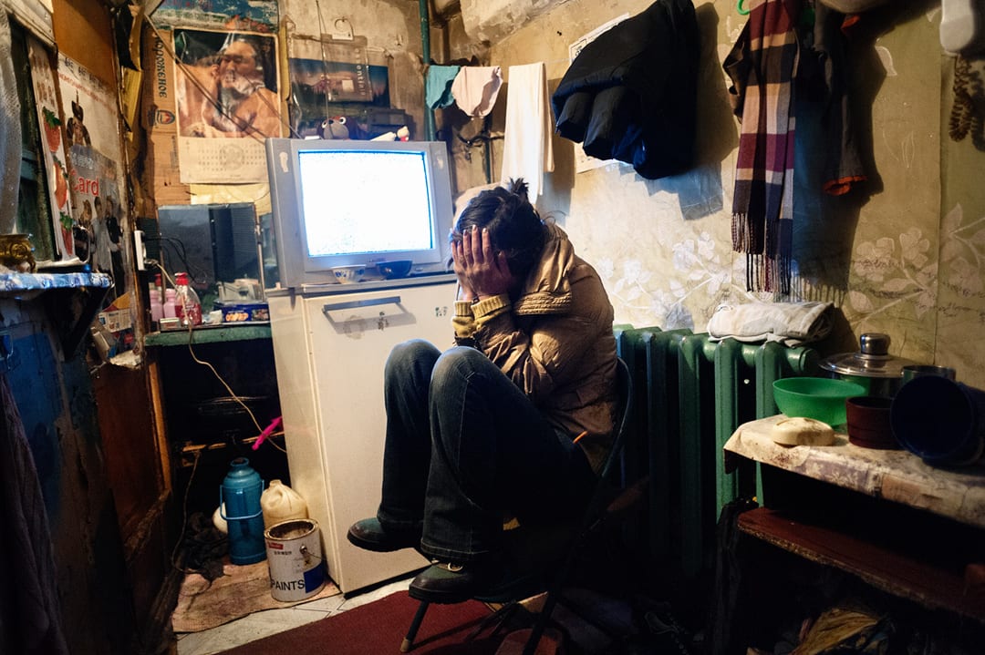 Ulaanbaatar, Mongolia. Dyun Erdene, 26 years, migrant and former shepherd, in the basement where she lives with her family...
