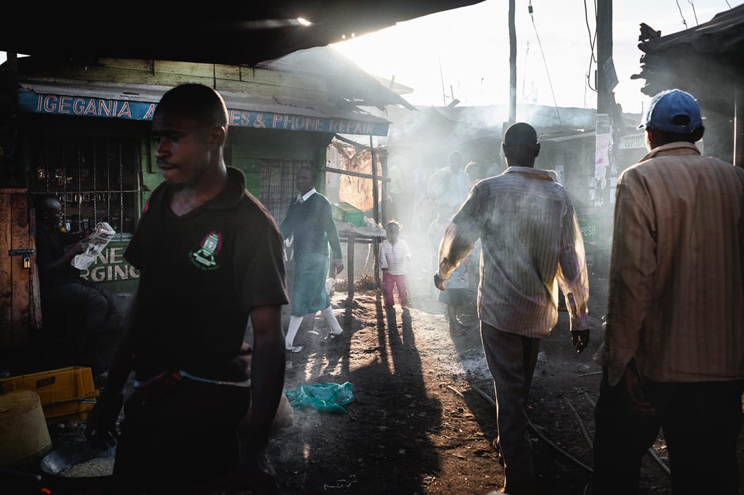 Kenya, Nairobi. Daily life in the cramped streets of the Kibera slum, where many environmental migrants fleeing the countr...