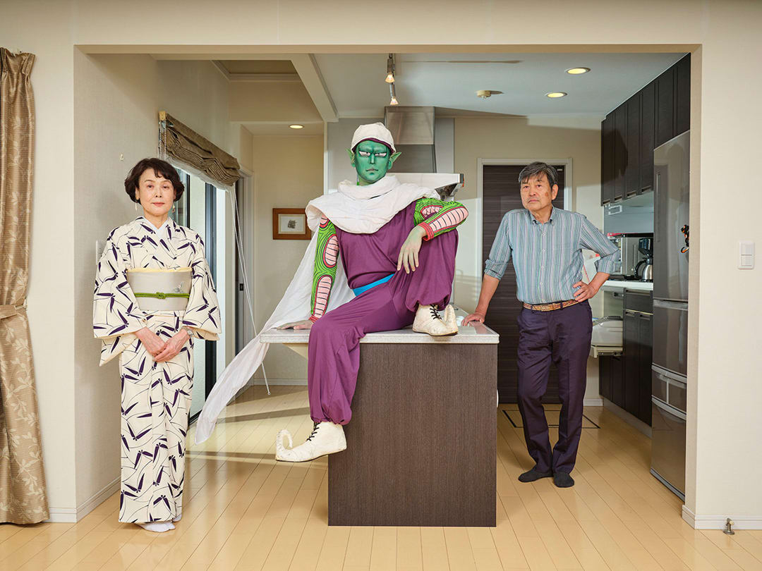 05/01/2024
Pretaporco (45) poses with his parents at home in Kanagawa, Japan. A performer and drag queen cosplaying for 20...