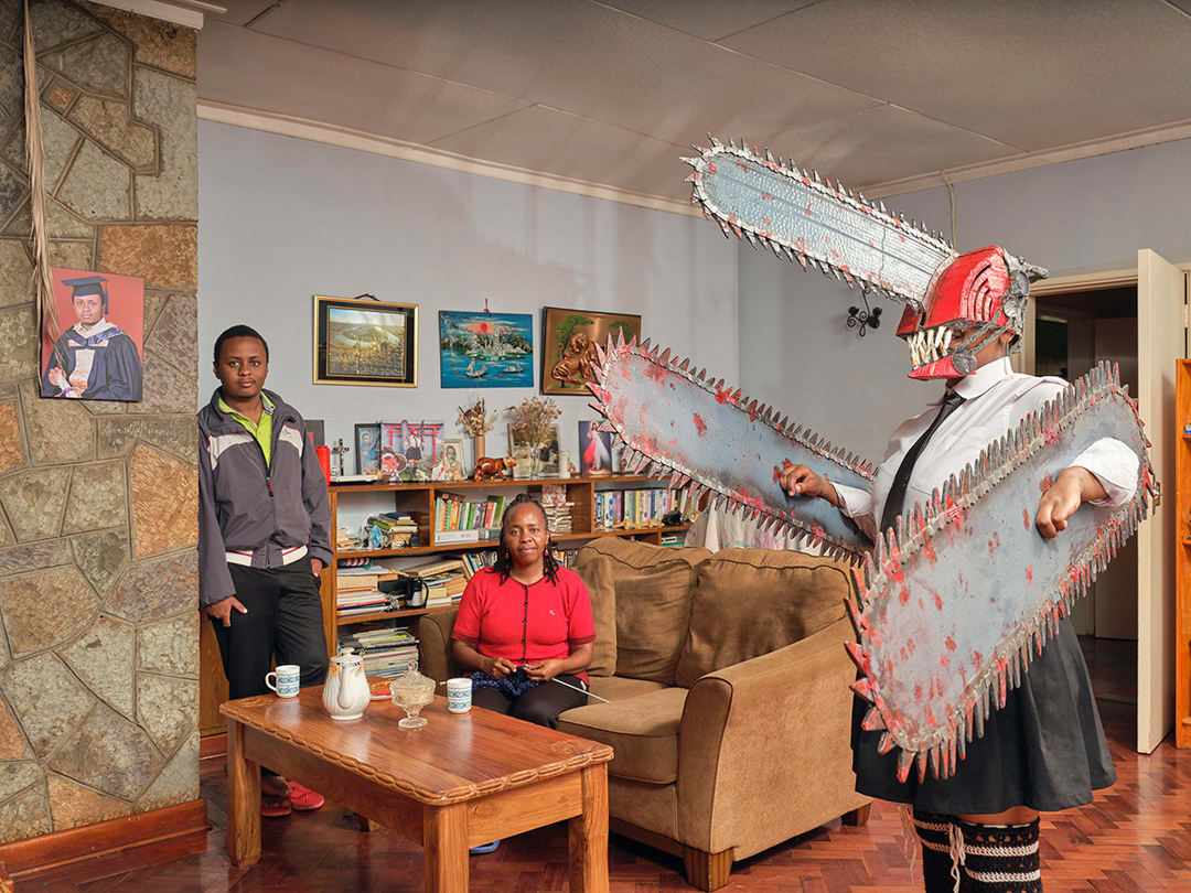 10/01/2024
Brenda (24) poses with her mother and brother in their living room, Thika (Kenya); she is a student and cosplay...
