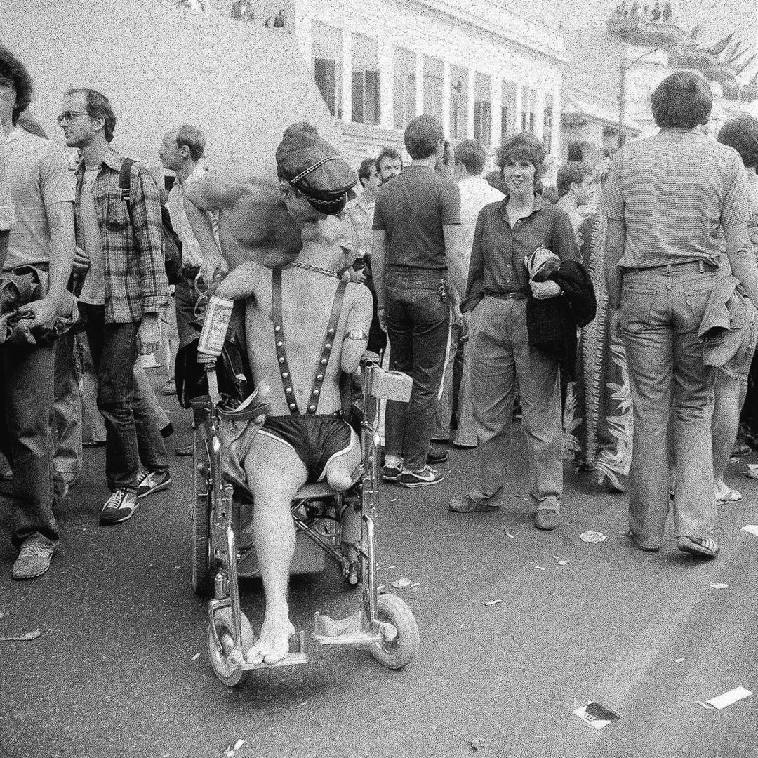 Patricia Jean O'Brien Sees Couple Kiss at Castro St. Fair, San Francisco, California, August 1979. © Meryl Meisler. Usage:...