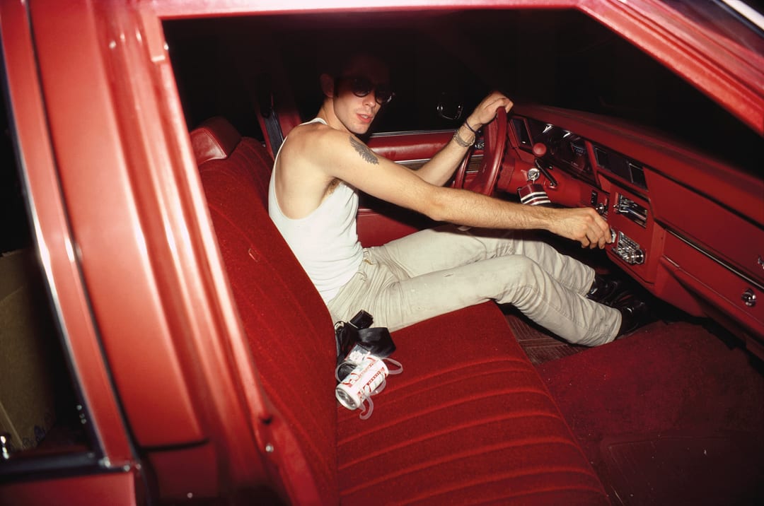 Mark in the red car, Lexington, Mass, 1979