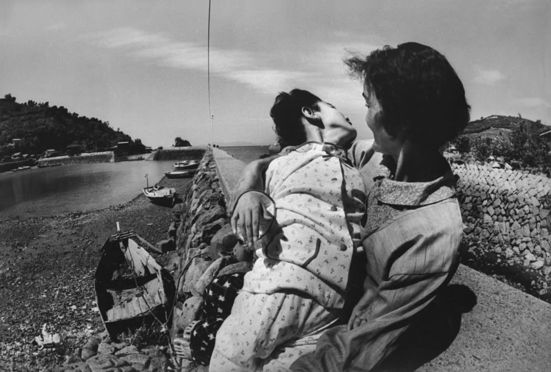 Takako Isayama, a 12-year-old fetal (congenital) victim of the Minamata disease, with her mother. Minamata. Japan. 1972 © ...