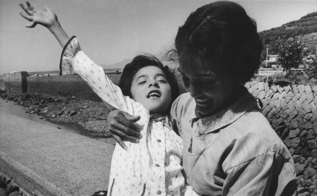 Takako Isayama, a 12-year-old fetal (congenital) victim of the Minamata disease, with her mother. Minamata. Japan. 1972 © ...