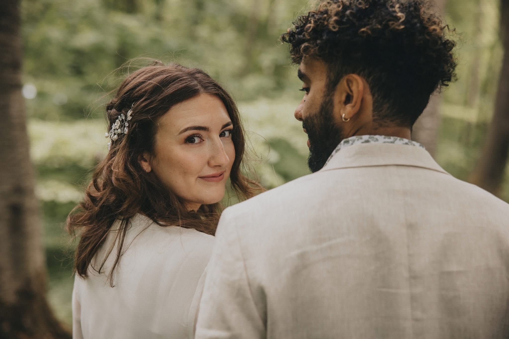 Engagement portrait by the lake woods