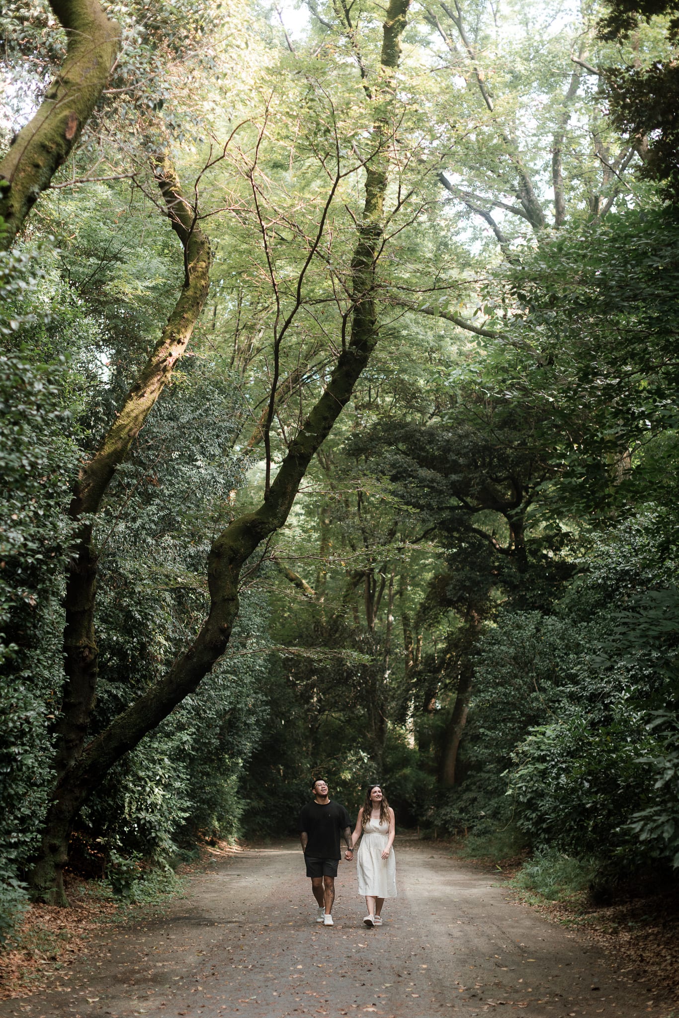 Summer couple engagement in a green Tokyo Garden