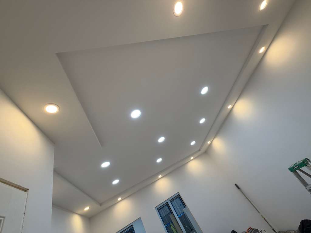 Custom coffered tray ceiling recessed lighting by Fibinachi Construction