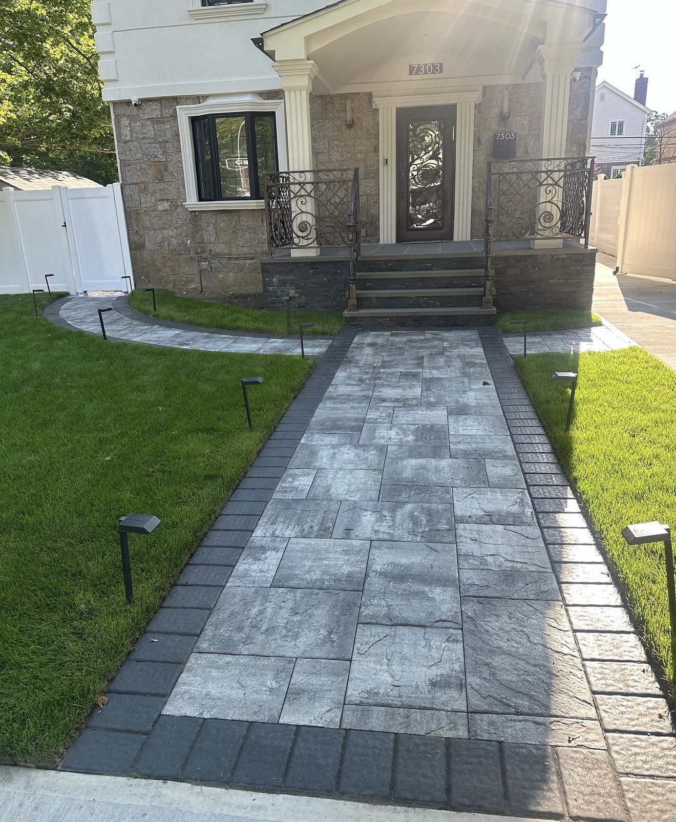 Paver walkway to luxury stone home by Fibinachi Construction NYC