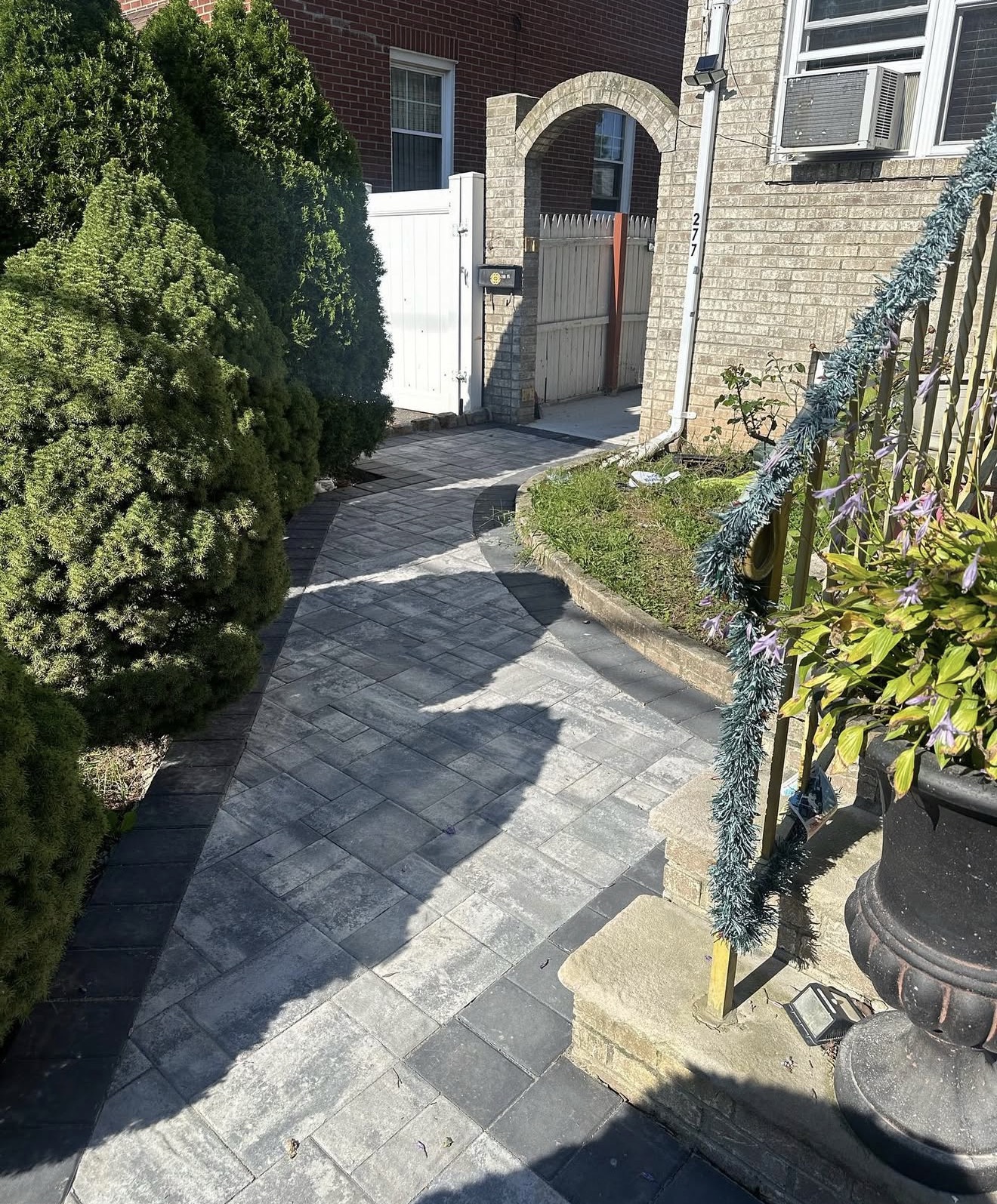Paver walkway curved front yard by Fibinachi Construction NYC