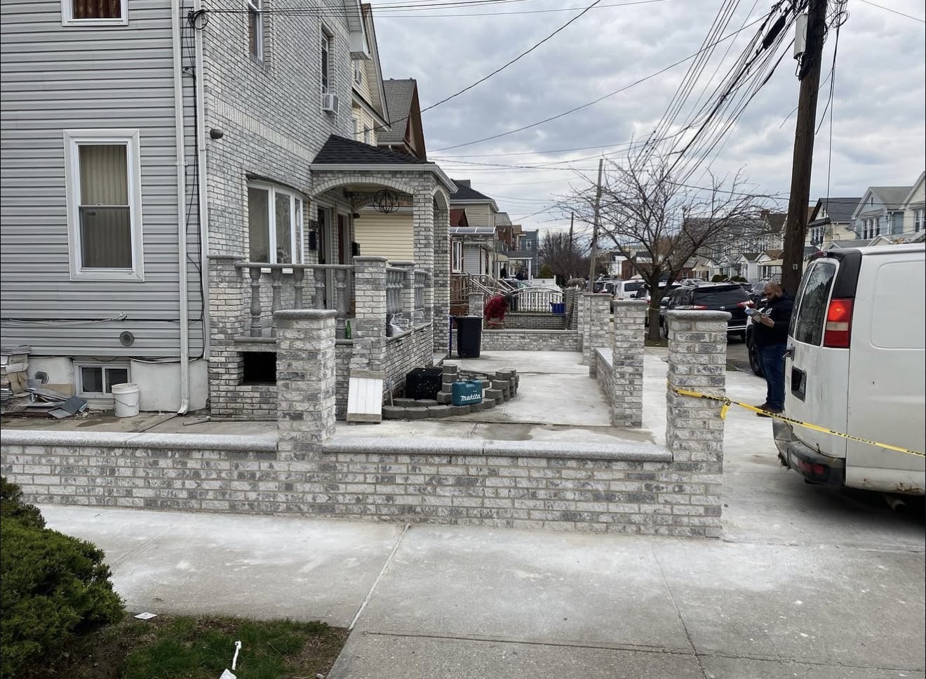 Masonry porch restoration with columns by Fibinachi Construction NYC