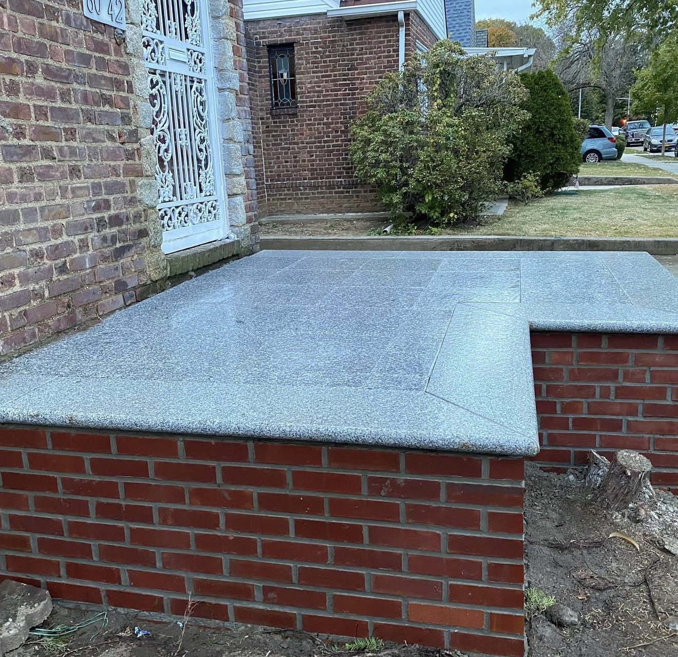 Brick stoop with granite cap by Fibinachi Construction NYC