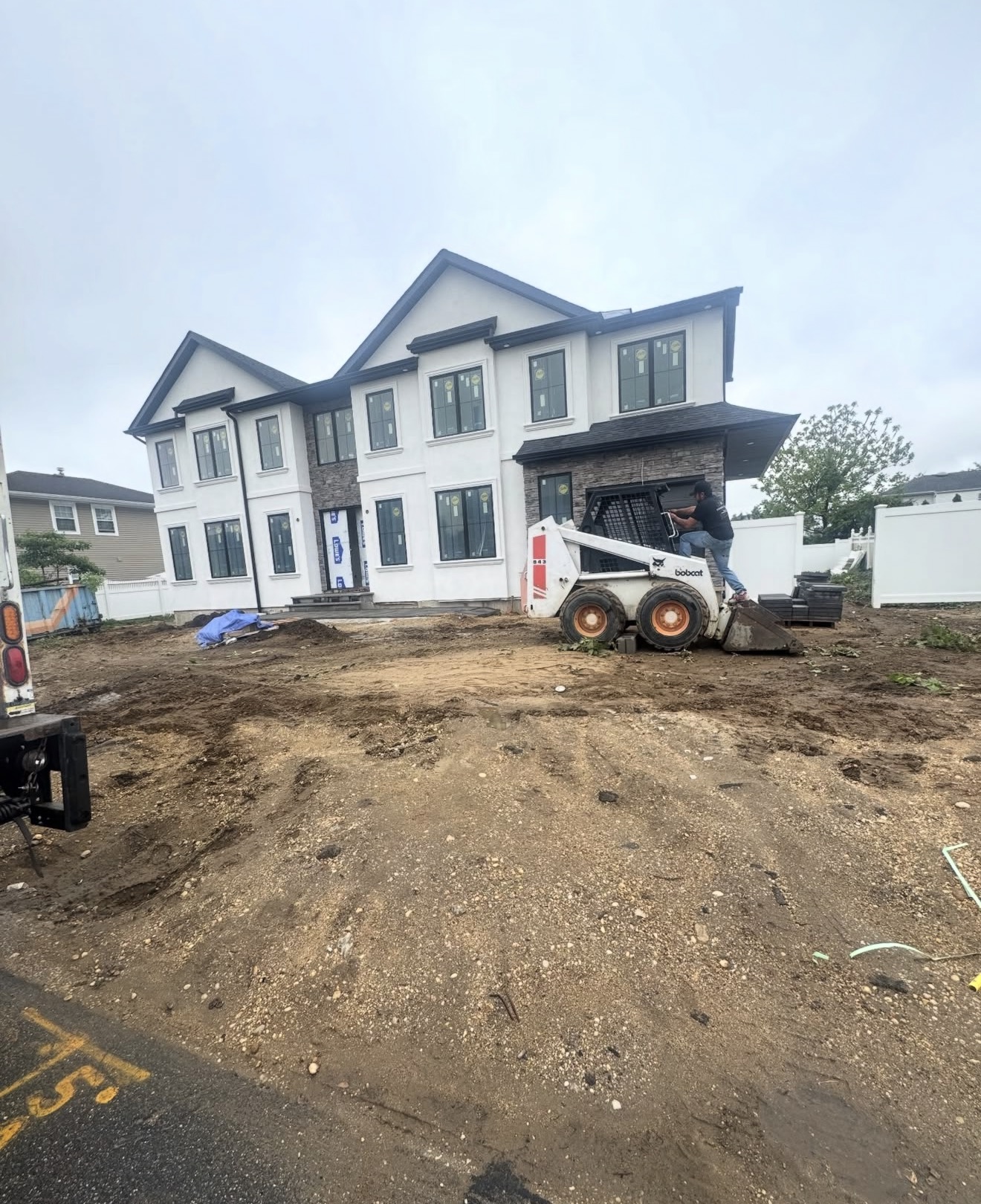 New construction luxury home site work by Fibinachi Construction