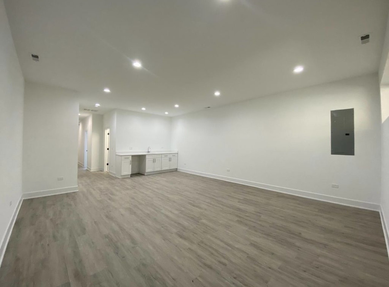 Open plan gut renovation kitchen by Fibinachi Construction NYC