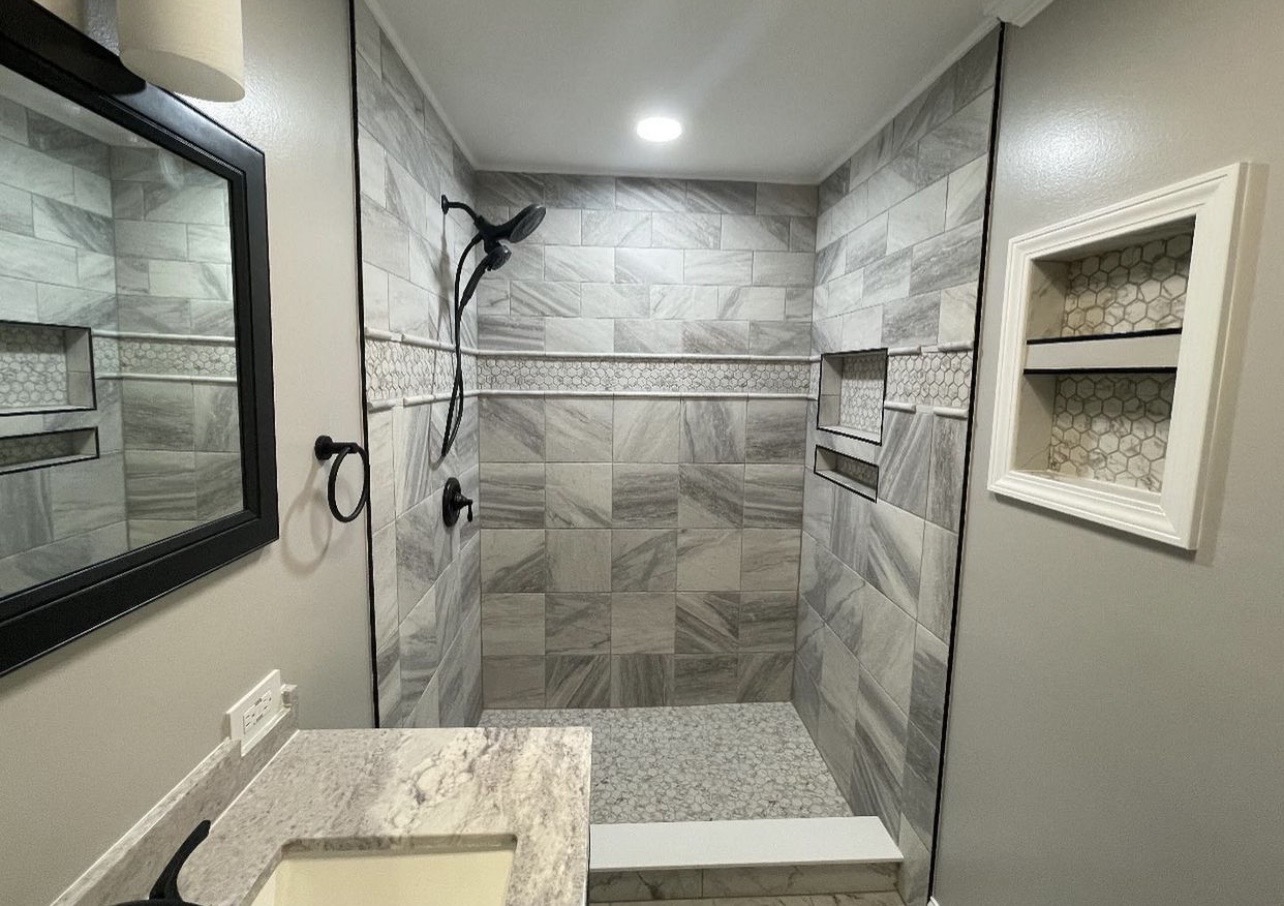 Tile shower custom niche renovation by Fibinachi Construction NYC