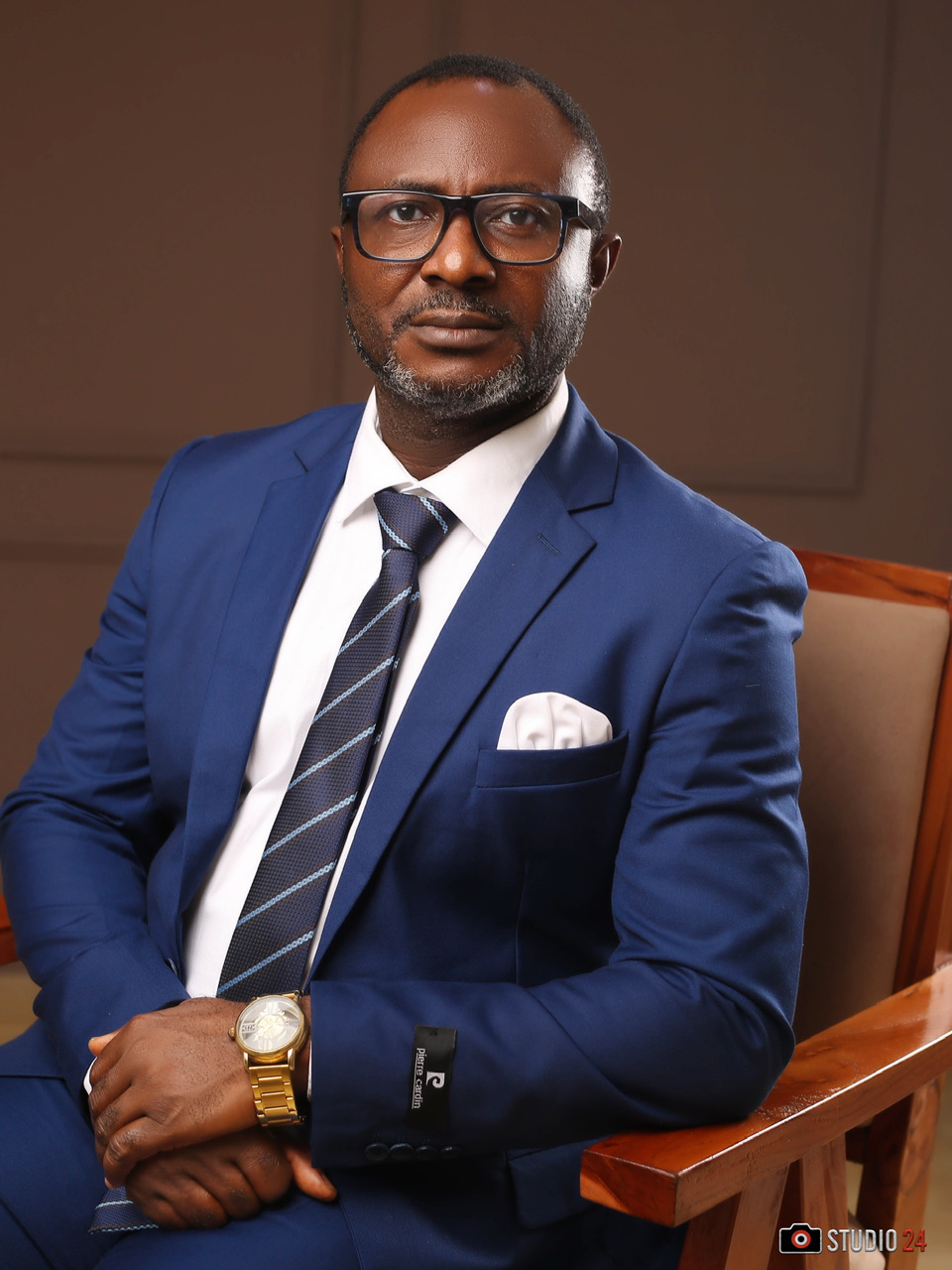 Professional portrait of Dr. Uchenna Clems Ozegbe