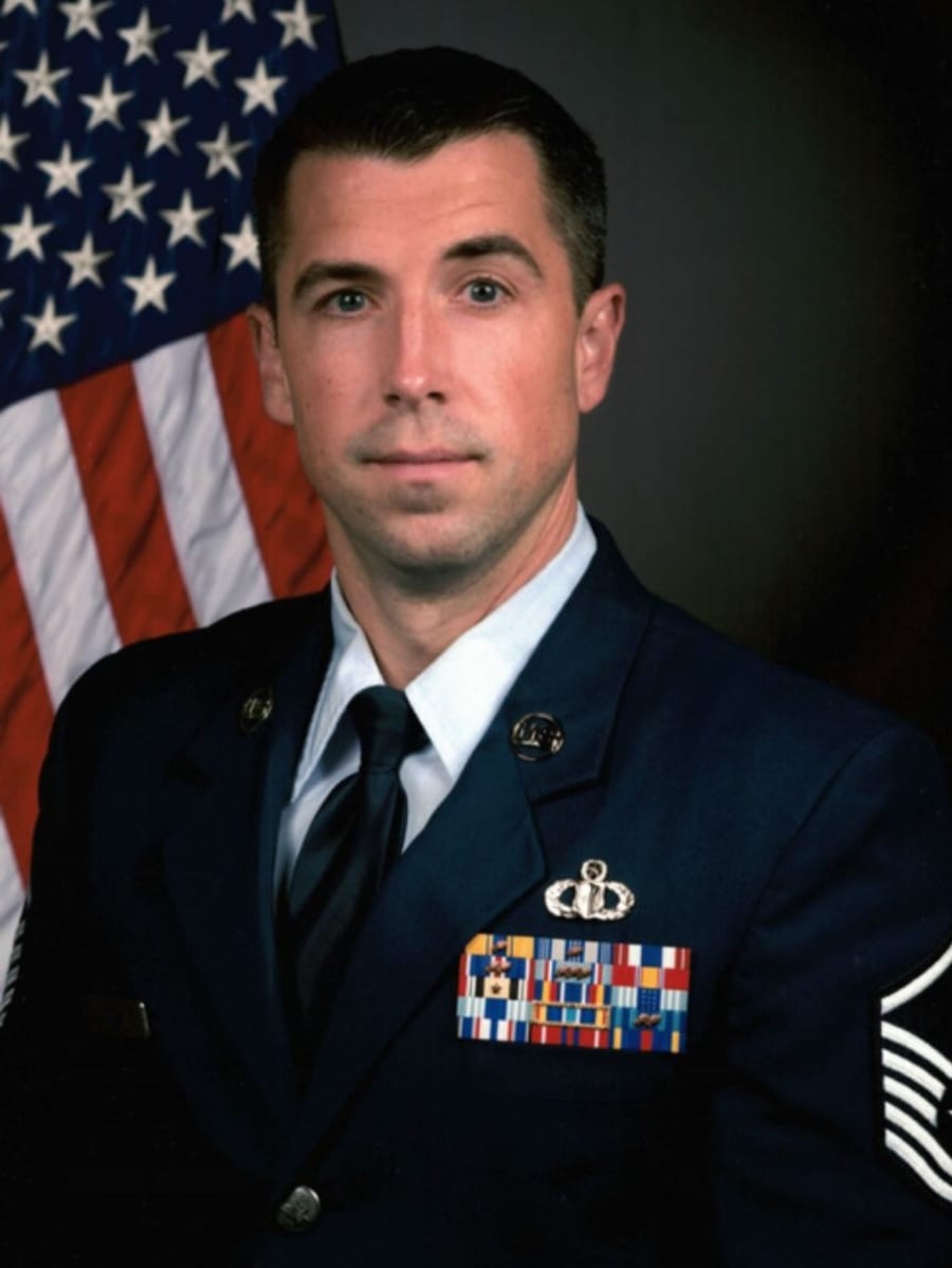 Master Sergeant Christopher Maye in United States Air Force service dress uniform, official portrait.