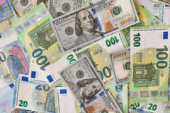 A detailed collage of Euro and Dollar banknotes showcasing international currency exchange.
