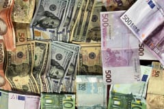 Assorted international banknotes showcasing different currencies. Ideal for finance-related themes.