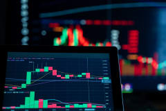 Close-up view of digital trading chart screen with vibrant graphs and data analysis.