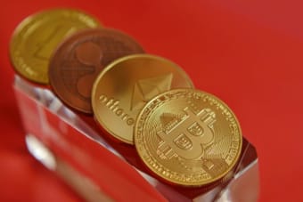 DOGE, XRP Lead Decline as Bitcoin ETFs See $80M Outflow