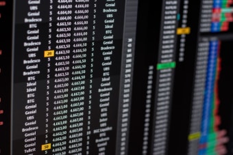 Close-up of financial data on a computer screen showing stock market trends.
