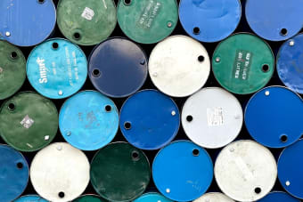 Aerial view of stacked colorful barrels in Myanmar, showcasing industrial design.