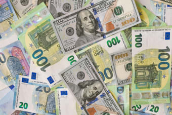 A detailed collage of Euro and Dollar banknotes showcasing international currency exchange.